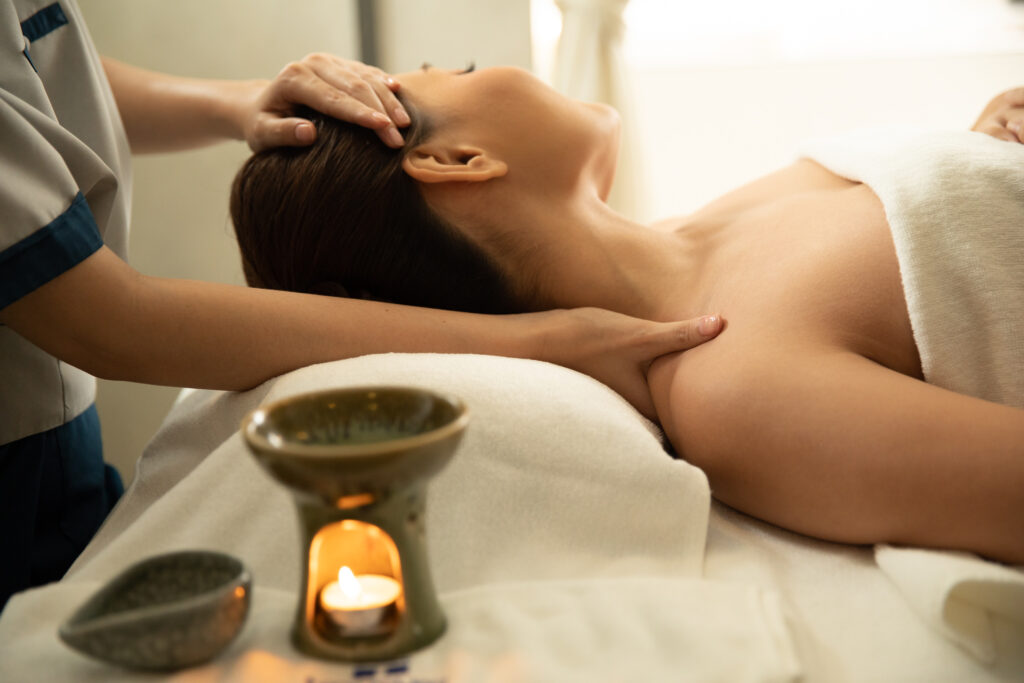 Warm oil massage Bangkok heated essential oils therapy Treasure Spa Siam professional treatment