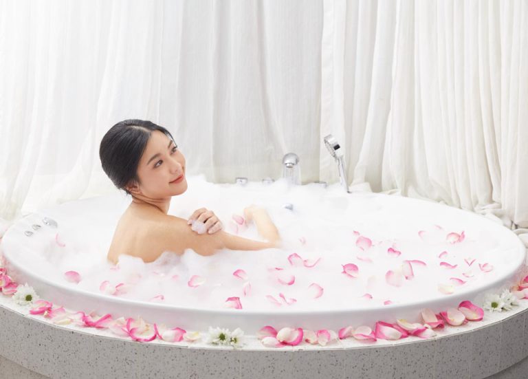 Woman Relaxing At Spa In Bubble Bath Among Rose Petals Bangkok Spa Siam SQ1