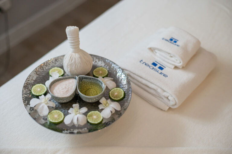 Luxury spa amenities and towels at Treasure Spa Bangkok