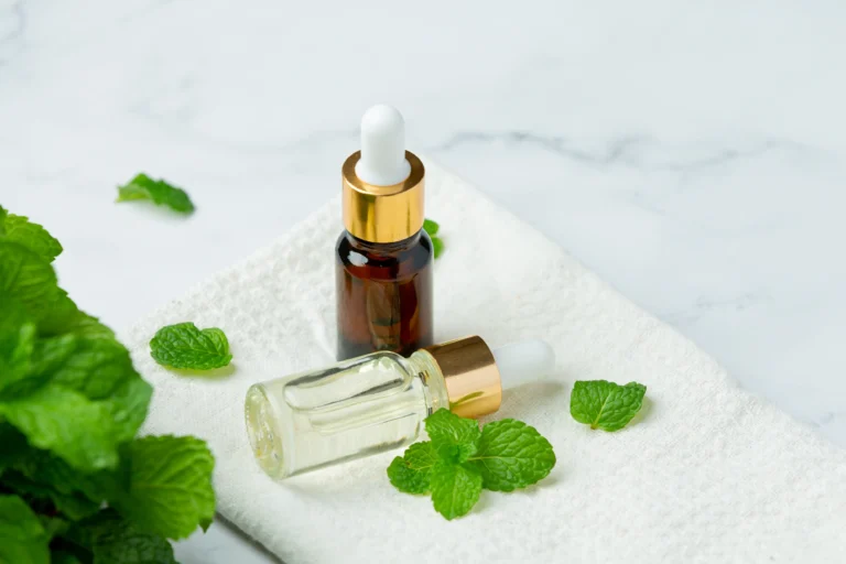essential-oil-peppermint-bottle-with-fresh-green-peppermint